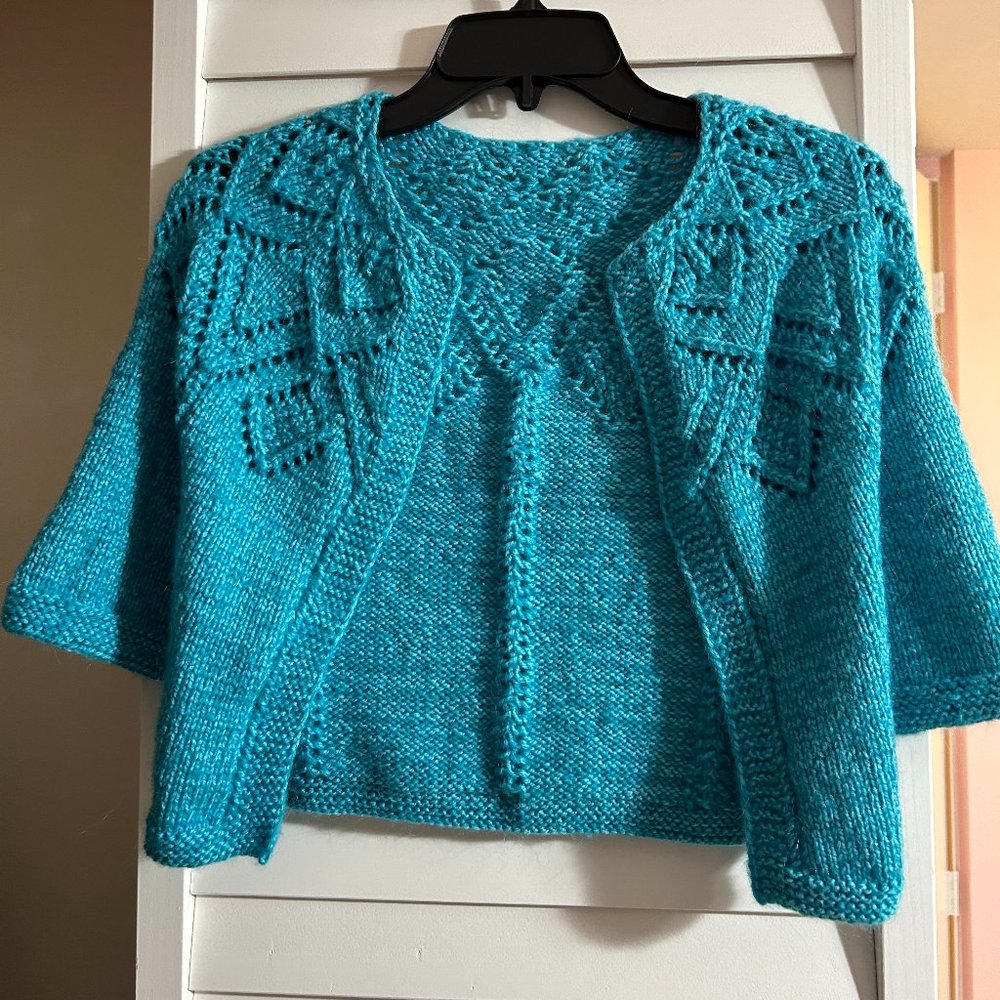 Cropped hand knit top